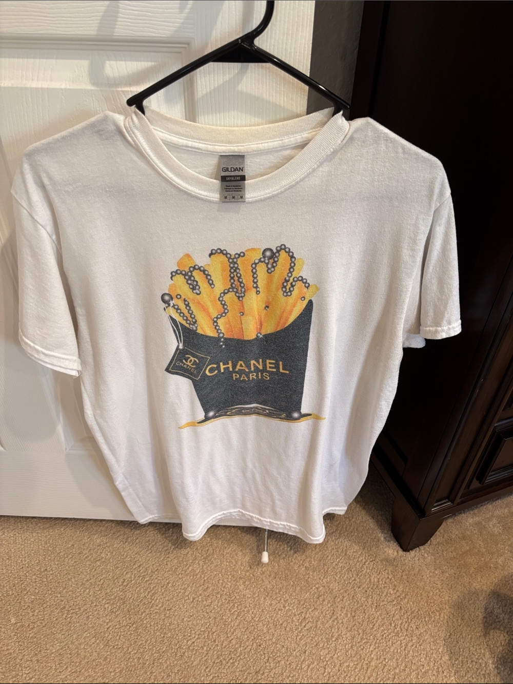 CHANEL White Tee with Yellow and Black Graphic